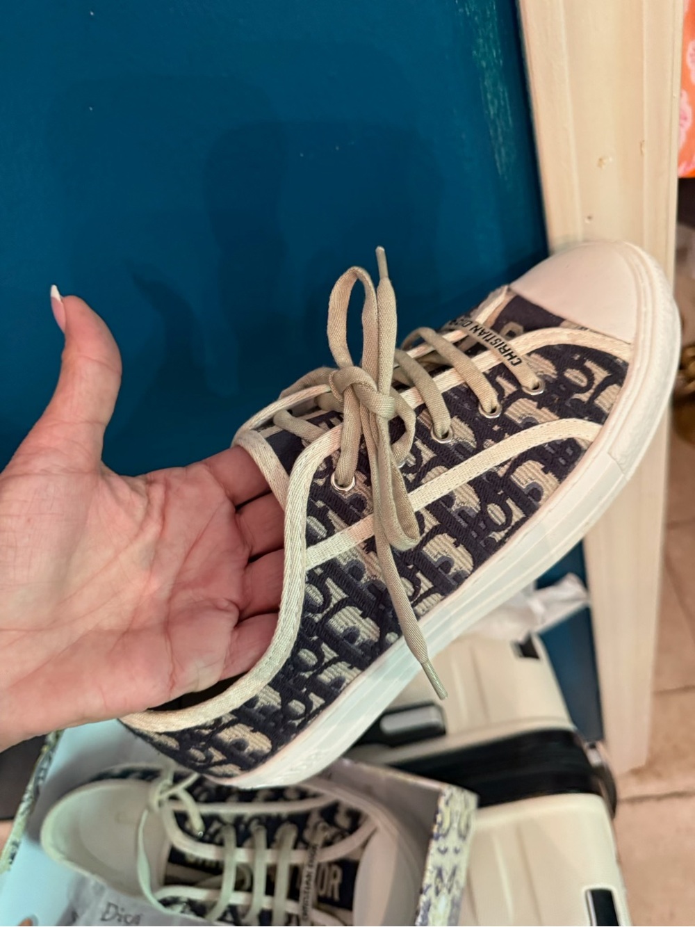 White Sneaker with Black Star Sole Detail